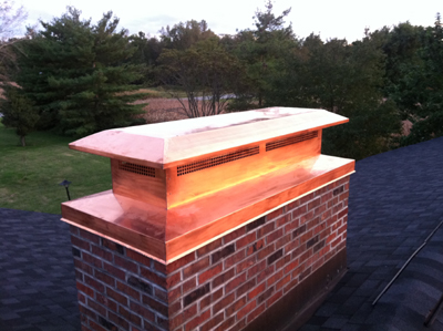 Before and after chimney cap replacement in Oceanside, NY