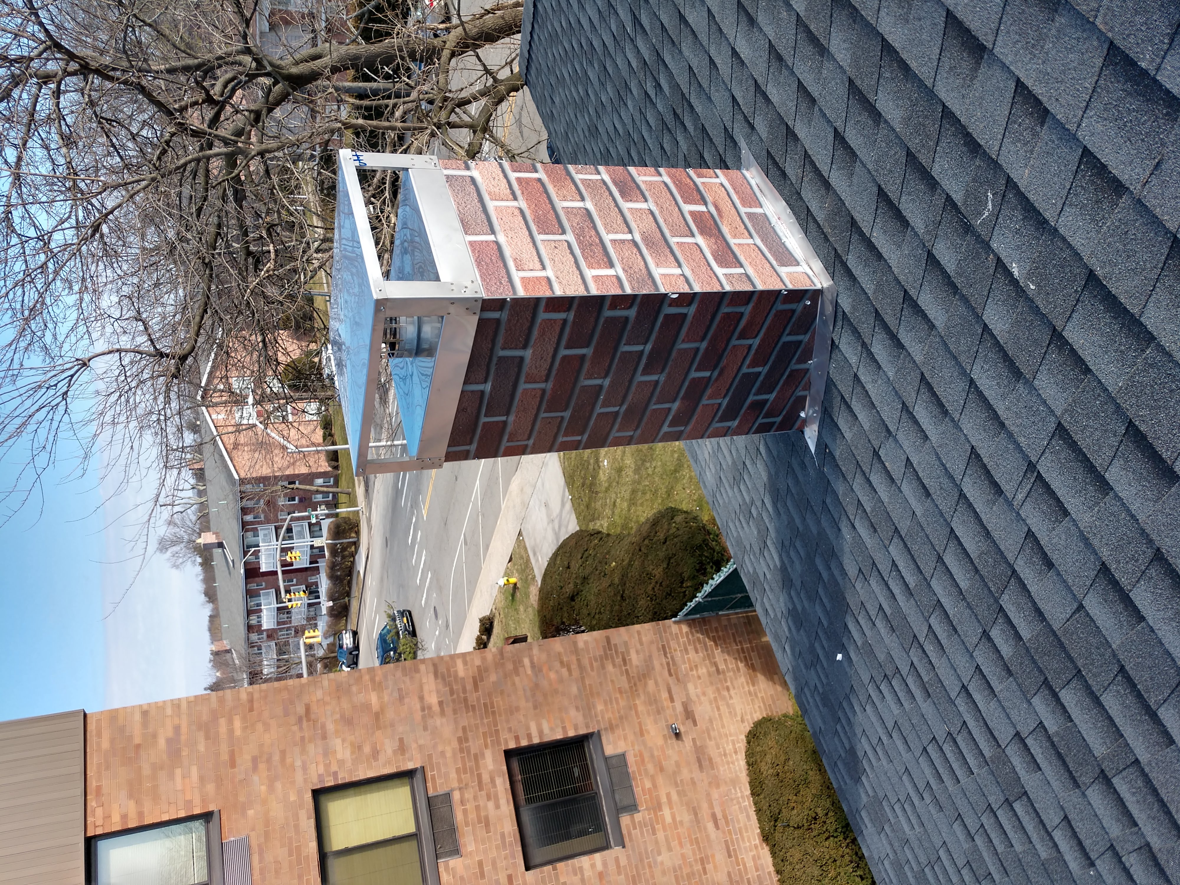 New elastomeric sealant applied to chimney crown in Oceanside, NY
