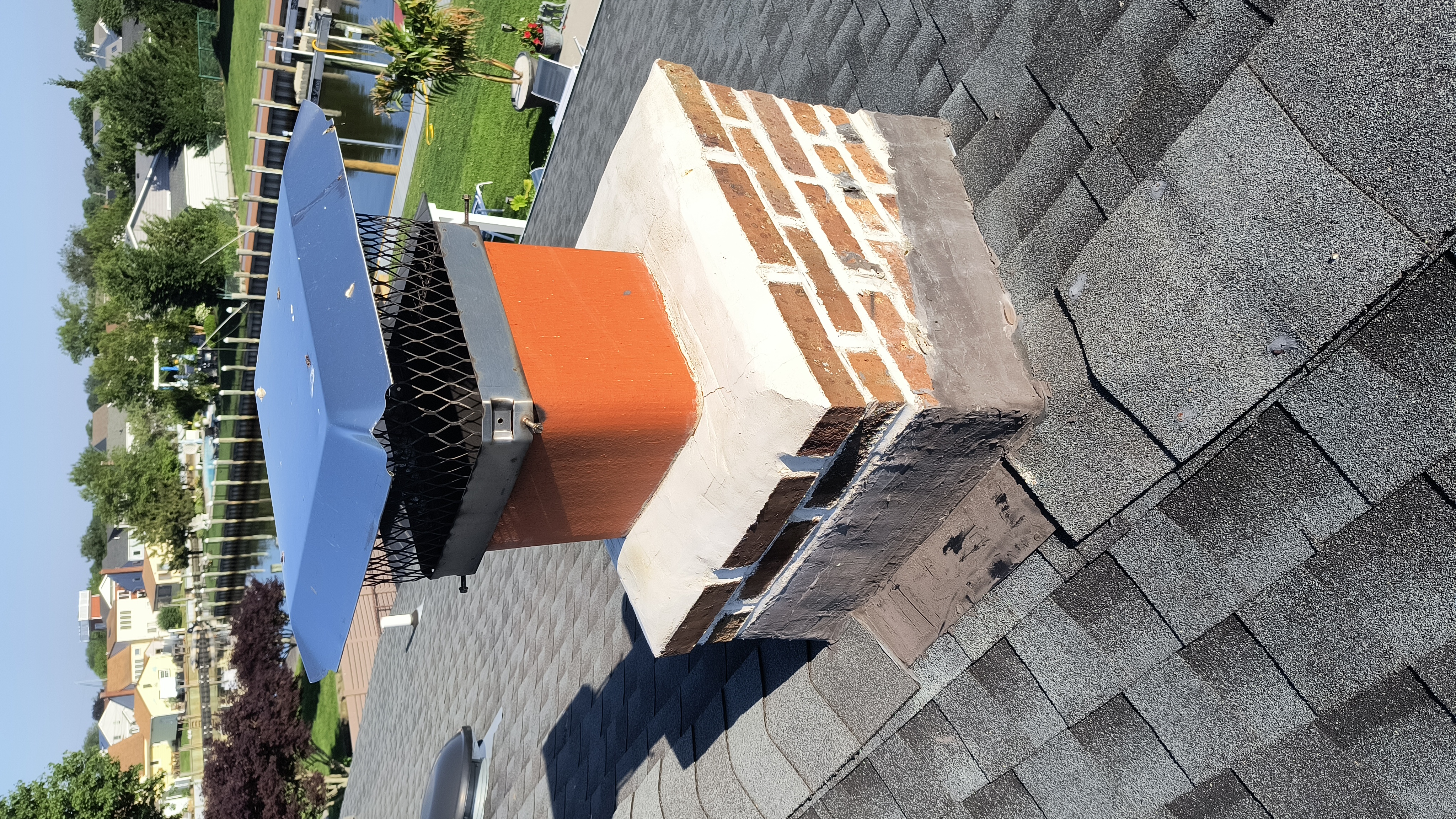 Full chimney masonry rebuild and restoration in Oceanside, NY