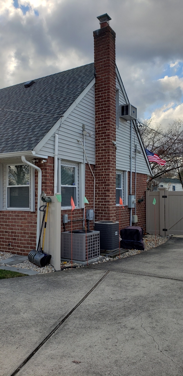 Professional chimney repointing restoring brick joints in Oceanside, NY
